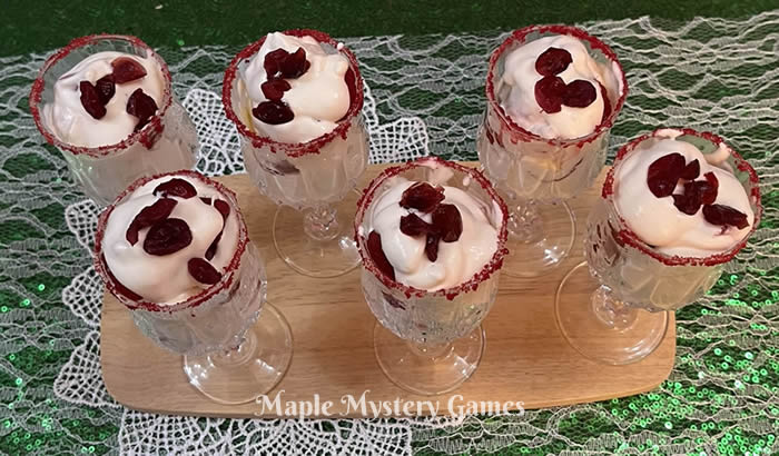 Christmassy Eton Mess with cranberries added to the raspberries and strawberries