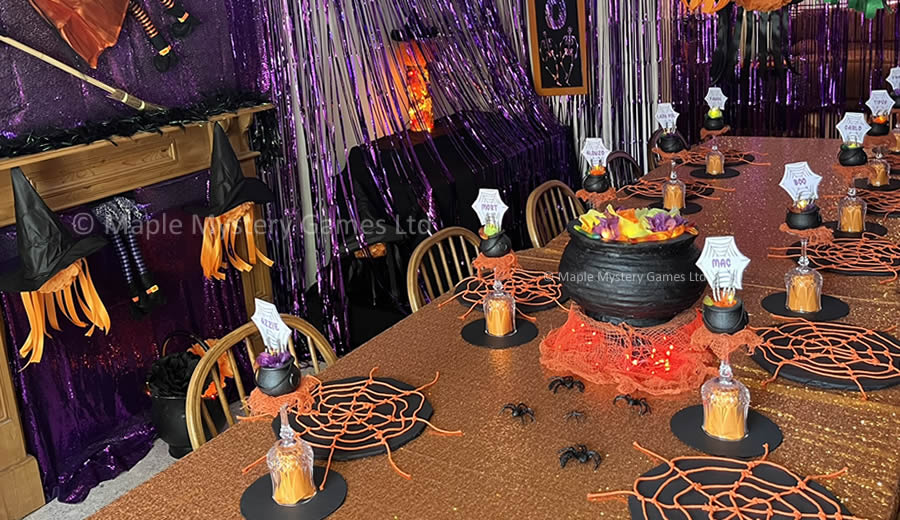 Cobwebs and cauldrons themed tablescape