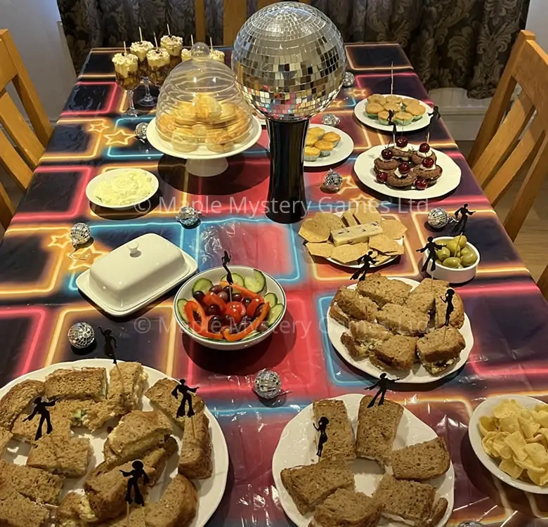 Simple buffet food is given a disco vibe with simple decorations