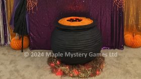 Large DIY witch's cauldron (30 inch) used as the center of our lounge Halloween decorations