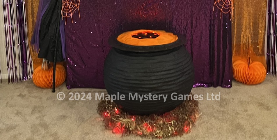 Large DIY witch's cauldron (30 inch) used as the center of our lounge Halloween decorations