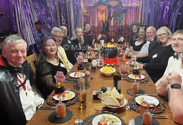 'Murder at the Halloween Party' - dinner table decorations with guests