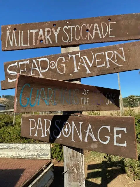 Outdoor sign for different places in Pirates, Plunder and Murder