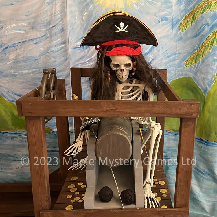 Skeleton dressed in a pirate's costume firing a wooden cannon